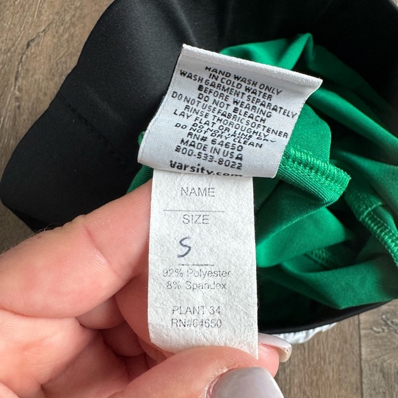 Varsity Shorts. White w/ green shorts. Women’s size small.Great used condition. - Picture 4 of 7